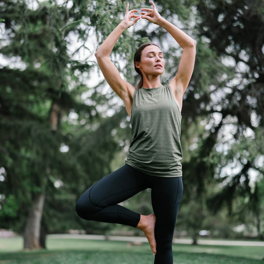 Olive zyia chill tank. Made of polyester and spandex, very cool and comfortable.